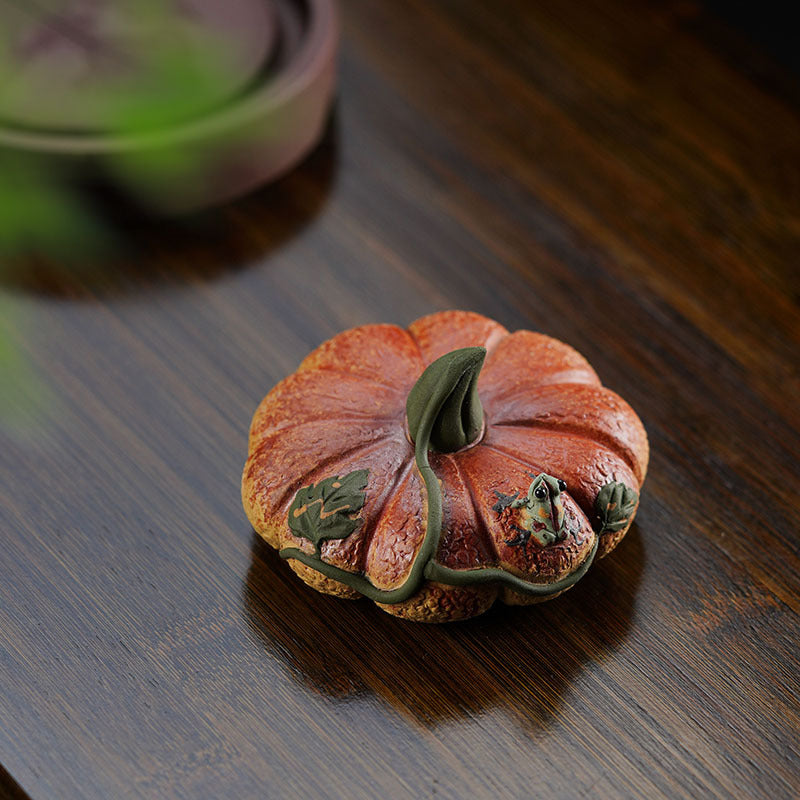 Handmade Yixing purple sand pumpkin tea pet ornament, featuring a frog design, perfect for tea sets and gifting.