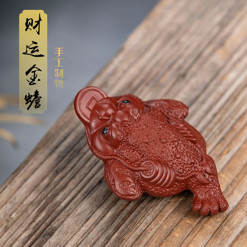 Handmade Yixing purple sand tea pet gourd sculpture, crafted from original purple sand by Yixing artisans.