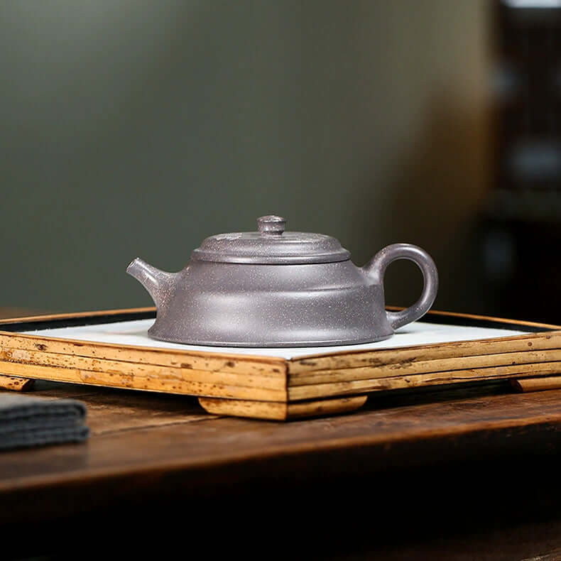 Handmade Yixing purple sand teapot, crafted from original purple clay, perfect for enjoying tea.