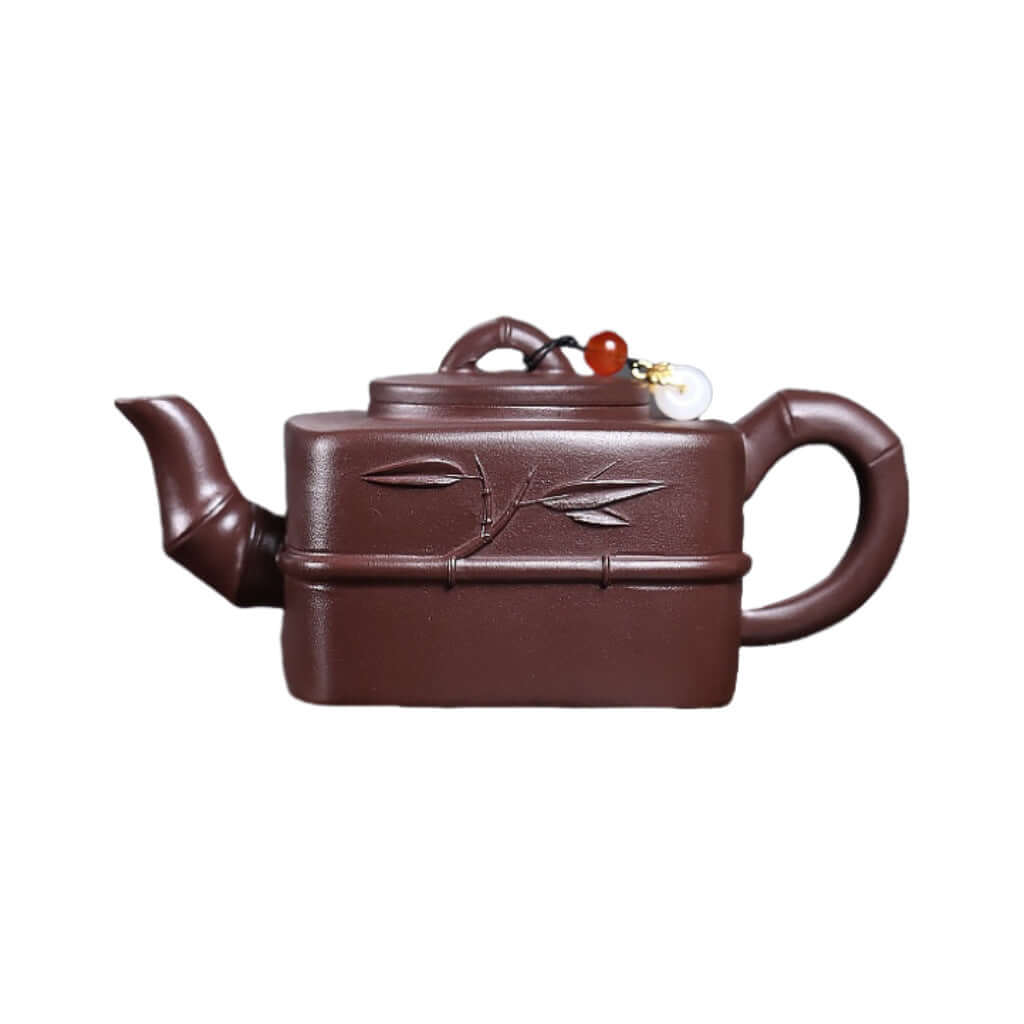 Handmade Yixing purple sand teapot with bamboo design, perfect for Kung Fu tea set and dropshipping.