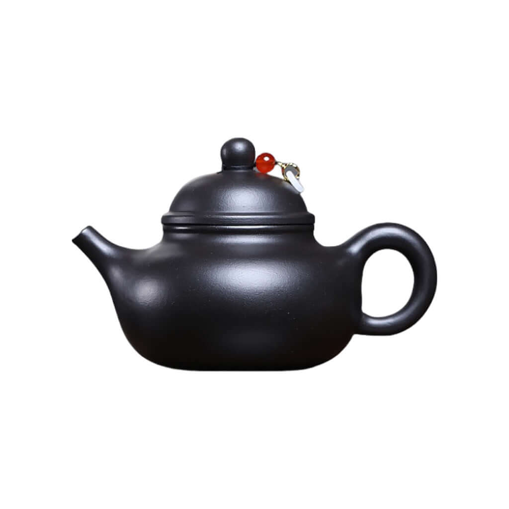 Handmade Yixing purple sand teapot, matte finish, original design for Kung Fu tea set. Perfect for tea enthusiasts.