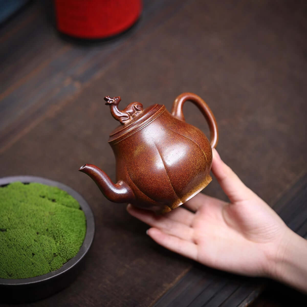 Handmade Yixing purple sand teapot, crafted from original purple clay, featuring a decorative lid with auspicious design.