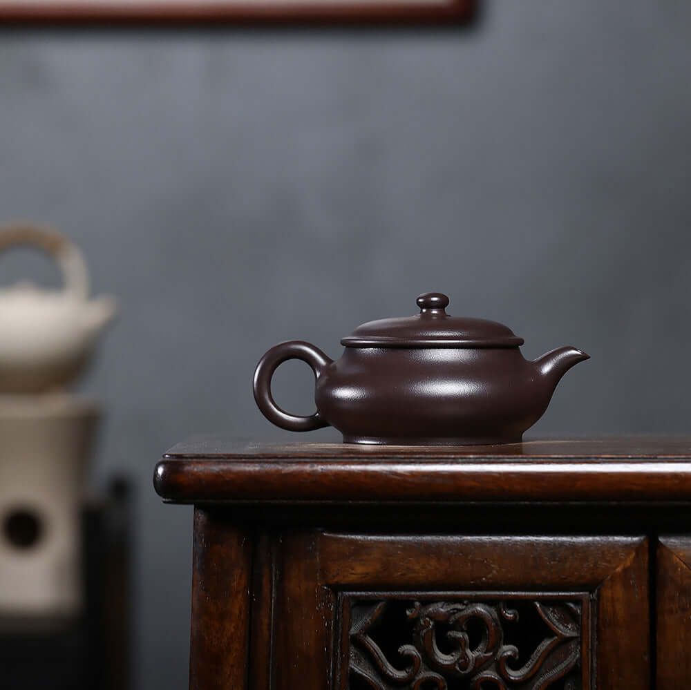 Handmade Yixing purple sand teapot, original mineral, perfect for Kung Fu tea set, elegant home decor.