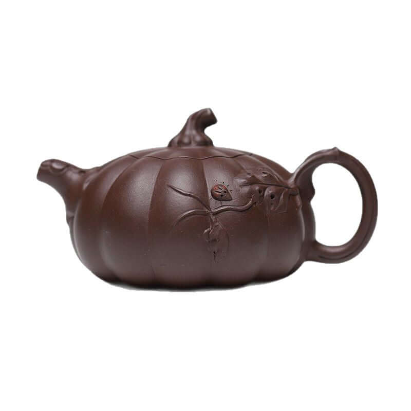 Handmade Yixing purple sand teapot in pumpkin shape, crafted with original purple sand for home tea use.