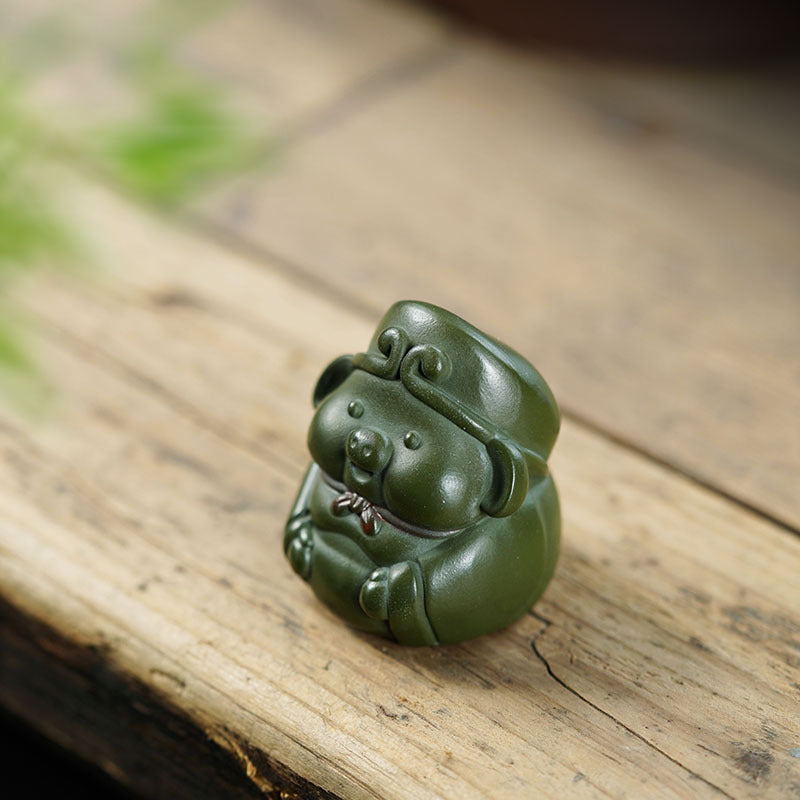 Handmade Yixing purple sand pig Bajie sculpture, perfect for tea table decor and tea play, showcasing original craftsmanship.