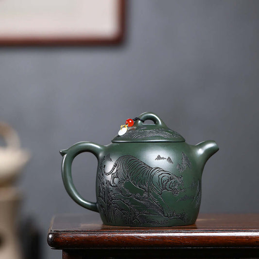Handmade Yixing purple sand teapot with tiger design and large capacity, perfect for household tea set.