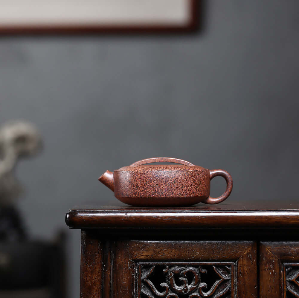 Handmade Yixing purple sand teapot, crafted from original mineral star sand mud, perfect for home Kung Fu tea brewing.