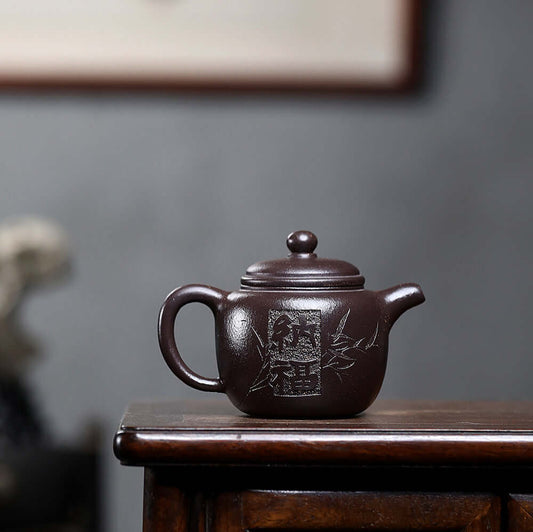 Handmade Yixing purple sand teapot featuring raw ore black gold sand, perfect for home kung fu tea sets.