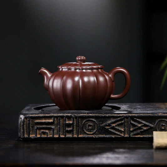 Handmade Yixing purple sand teapot with a unique design, showcasing intricate craftsmanship and original purple sand material.