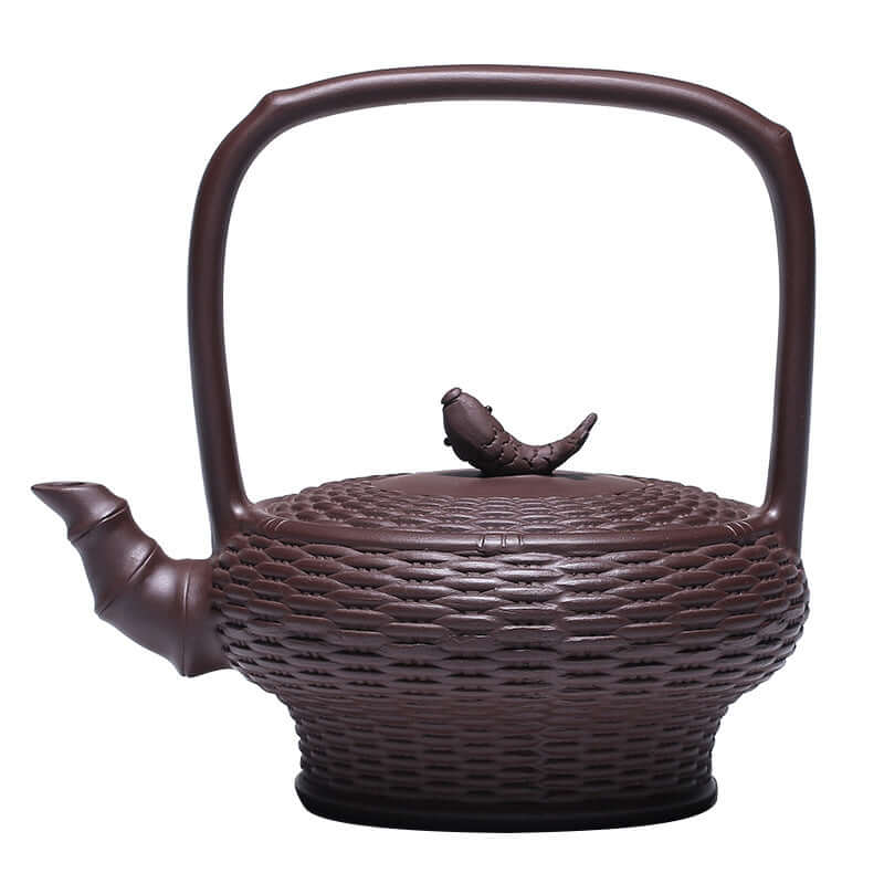 Handmade Yixing purple sand teapot with bamboo fish basket design and unique handle, 500cc capacity, elegant craftsmanship.