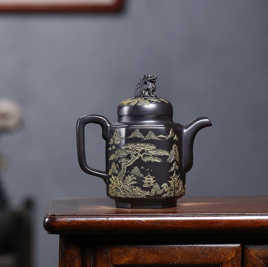 Handmade Yixing purple sand teapot with intricate mountain design, perfect for home kung fu tea set.
