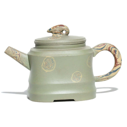 Handmade Yixing purple sand teapot in green color with unique design and twisted handle, perfect for kung fu tea sets.