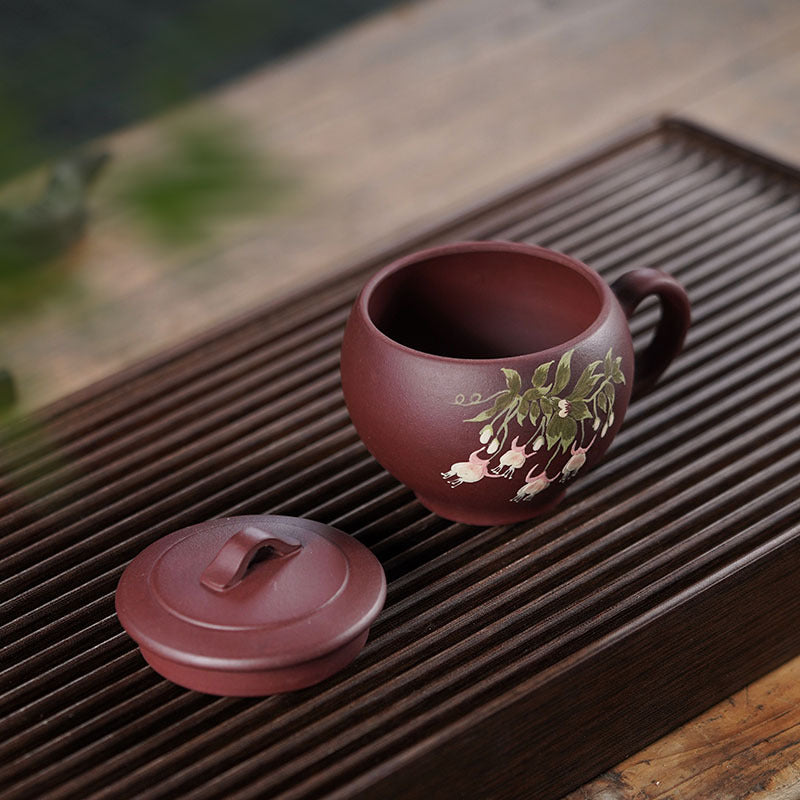 Handmade Yixing purple sand teapot with floral design, perfect for kung fu tea, 150cc original purple clay craftsmanship.