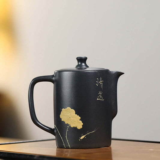 Handmade Yixing purple sand teapot with elegant floral design and inscription, ideal for Kung Fu tea set.