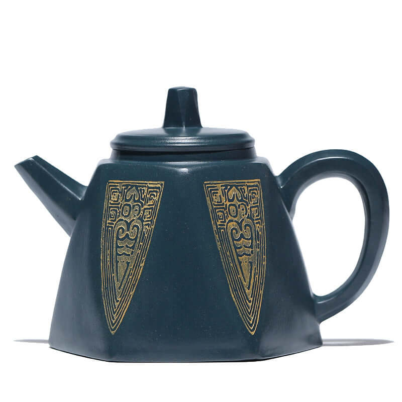 Handmade Yixing purple sand teapot featuring intricate patterned design, ideal for tea enthusiasts.