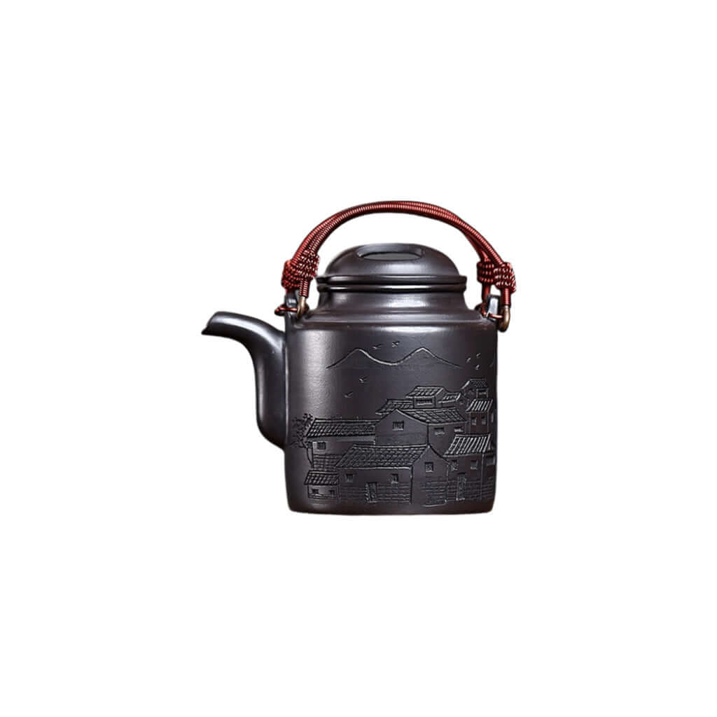 Handmade Yixing purple sand teapot with a scenic design and a sturdy lifting beam handle for tea enthusiasts.