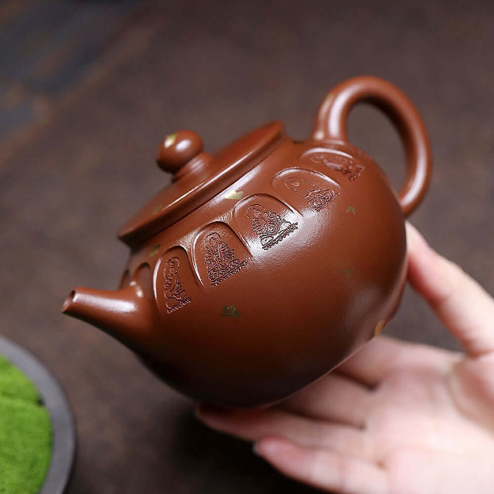 Handmade Yixing purple sand teapot, crafted from raw ore, showcasing Dunhuang heritage design for kung fu tea.