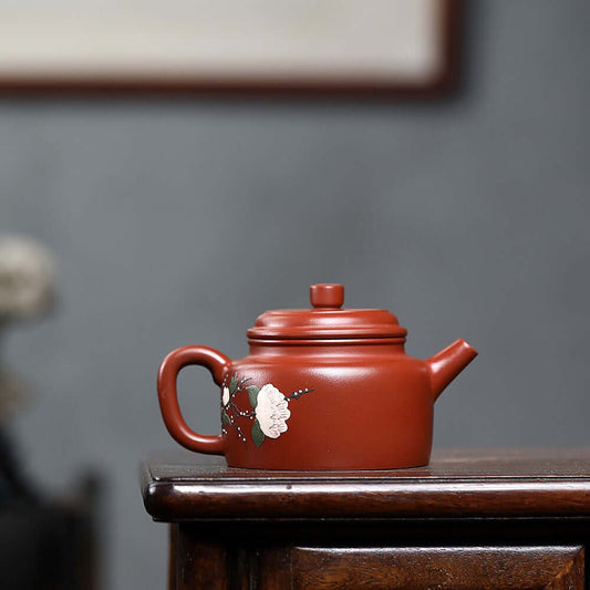 Handmade Yixing purple sand teapot featuring floral design, perfect for home Kung Fu tea set.