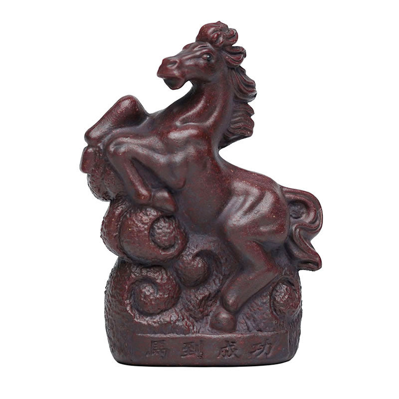 Handmade Yixing purple sand tea pet ornament featuring a rearing horse, perfect for tea sets or as a decorative piece.