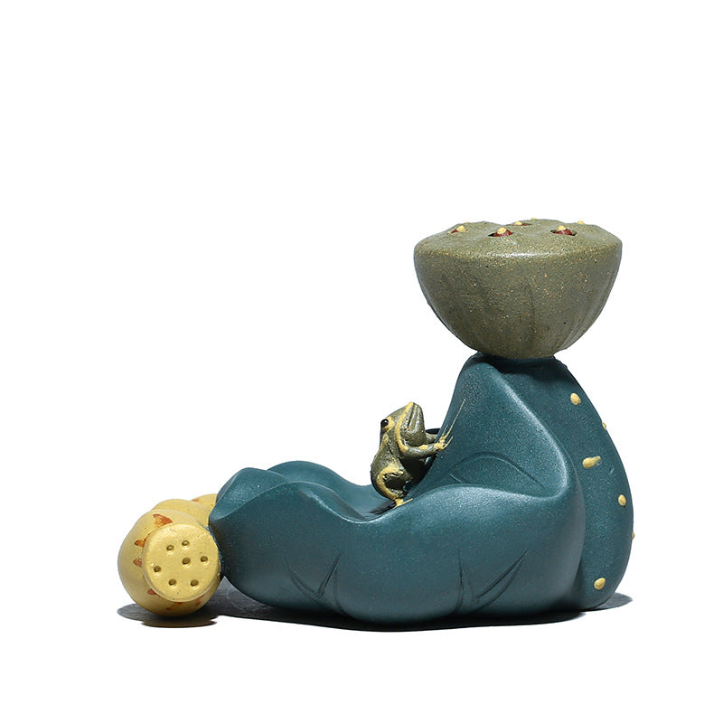 Handmade Yixing purple sand teapot decoration featuring a frog on a lotus leaf design.
