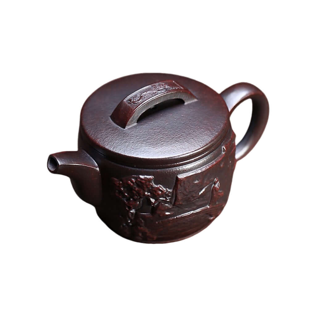 Handmade Yixing purple sand teapot with intricate design, showcasing original craftsmanship and thick virtue for tea lovers.