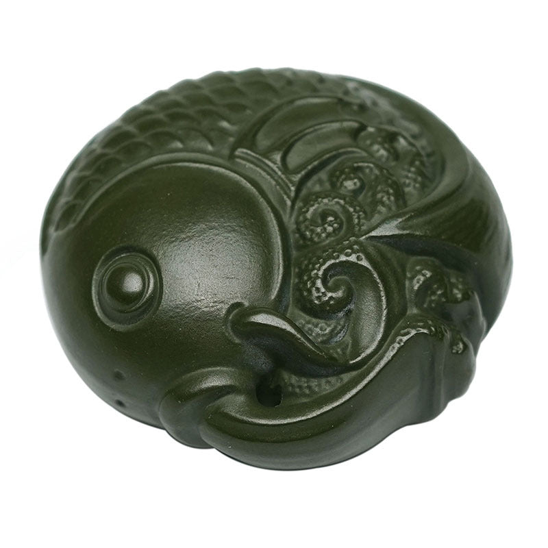 Handmade Yixing purple sand tea pet, green mud ornament, unique fish sculpture for tea table decoration.