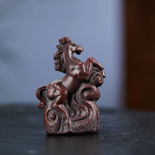 Handmade Yixing purple sand tea pet ornament featuring a rearing horse design, ideal for tea sets and collectors.