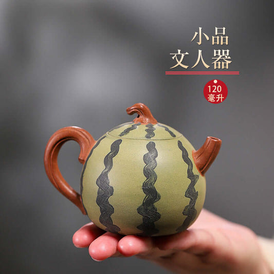 Handmade Yixing purple sand teapot in watermelon shape, 120cc capacity, showcasing unique craftsmanship and design.