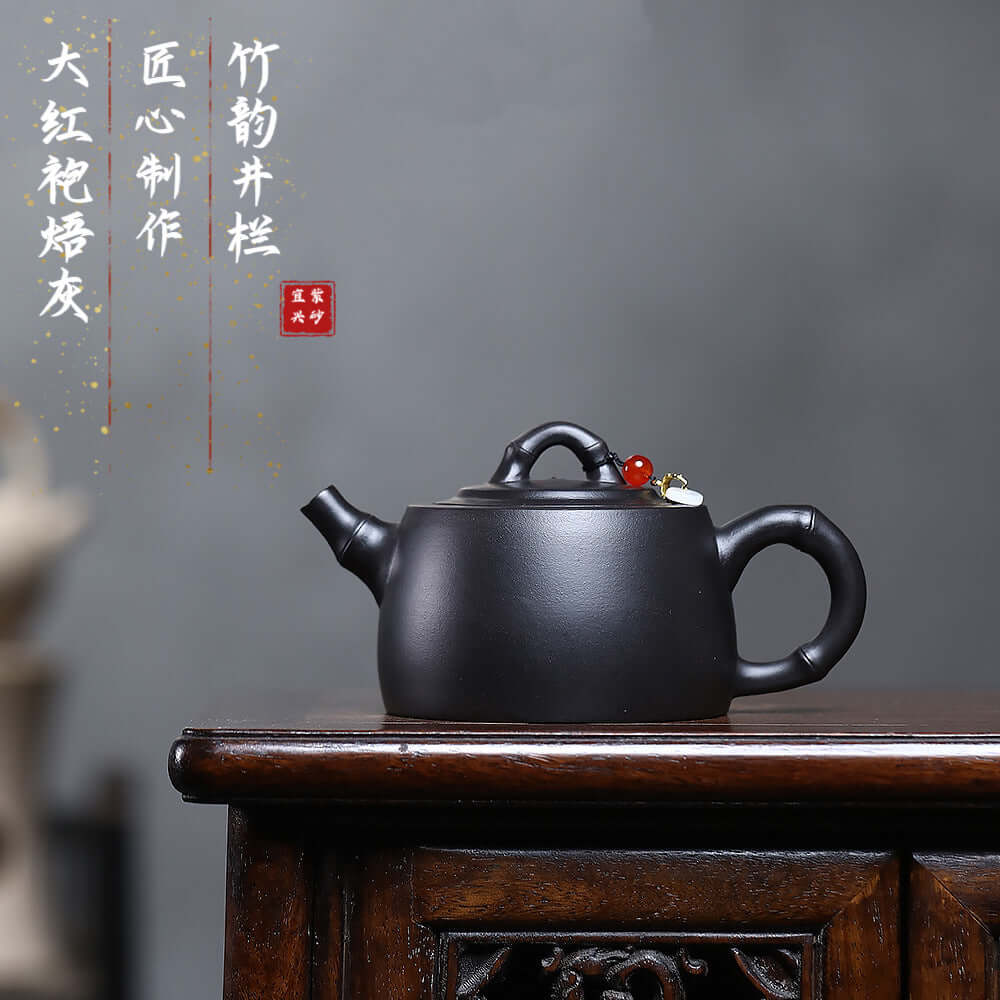 Handmade Yixing purple sand teapot, Da Hong Pao with bamboo pattern, perfect for Kung Fu tea rituals.