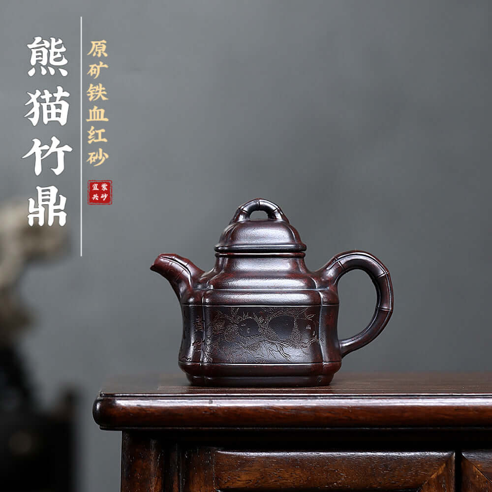 Handmade Yixing purple sand teapot with iron red sand finish, perfect for kung fu tea sets, crafted by Yixing artisans.