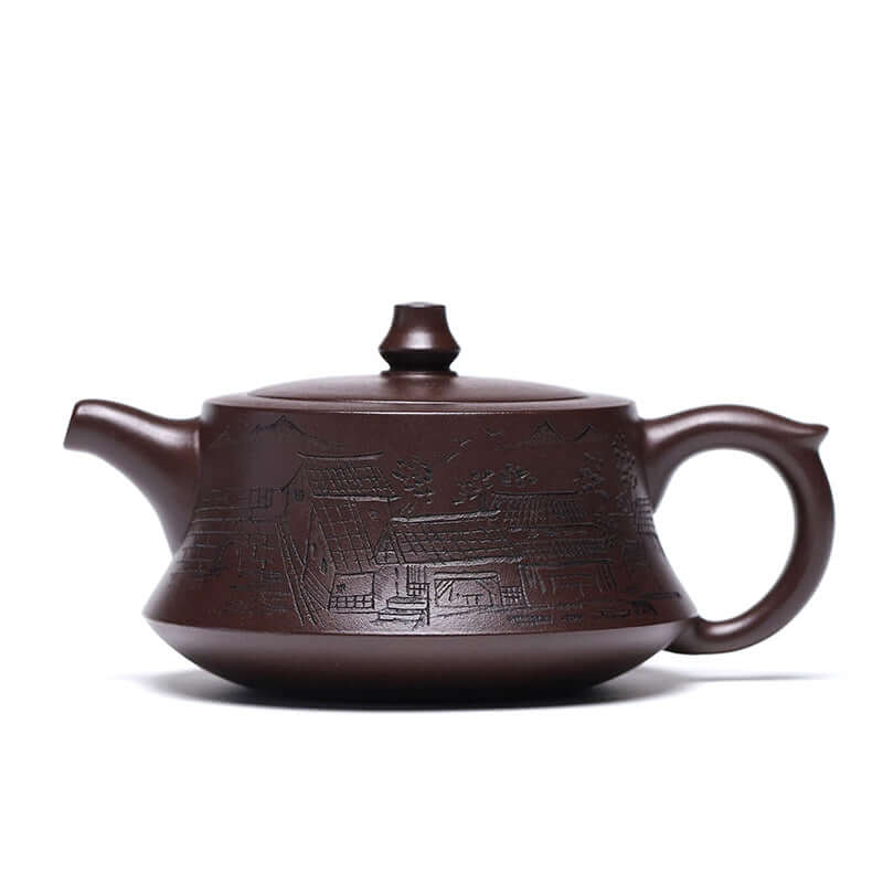 Handmade Yixing purple sand teapot with intricate village engraving, showcasing traditional craftsmanship and elegant design.