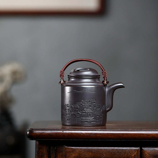 Handmade Yixing purple sand teapot with a lifting beam, showcasing intricate designs, perfect for kung fu tea sets.