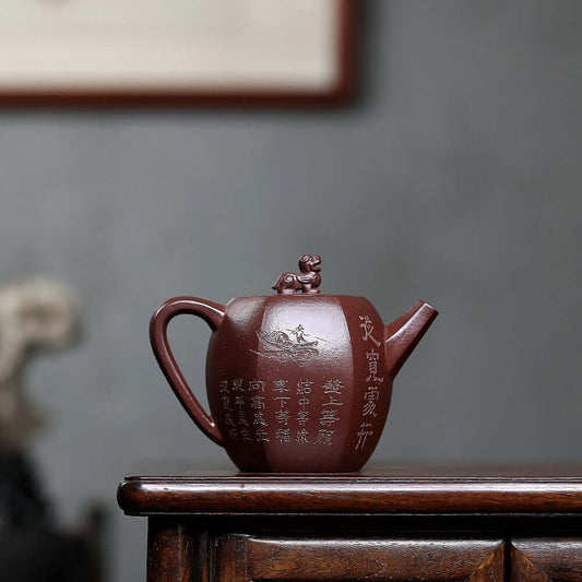 Handmade Yixing purple sand teapot with intricate design, perfect for a kung fu tea set and original craftsmanship.