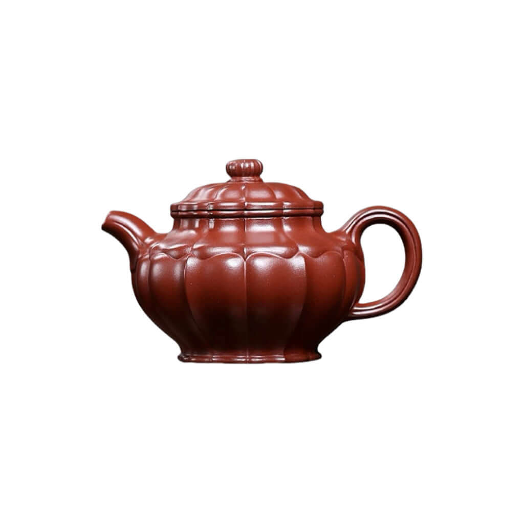 Handmade Yixing purple sand teapot with a dragon rib pattern, perfect for home kung fu tea sets.