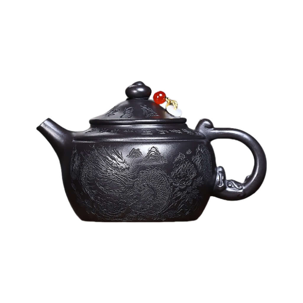 Handmade Yixing purple sand teapot with dragon design, perfect for Kung Fu tea ceremonies and home decor.