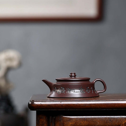 Handmade Yixing purple sand teapot with elegant design, perfect for kung fu tea set, showcasing original craftsmanship.