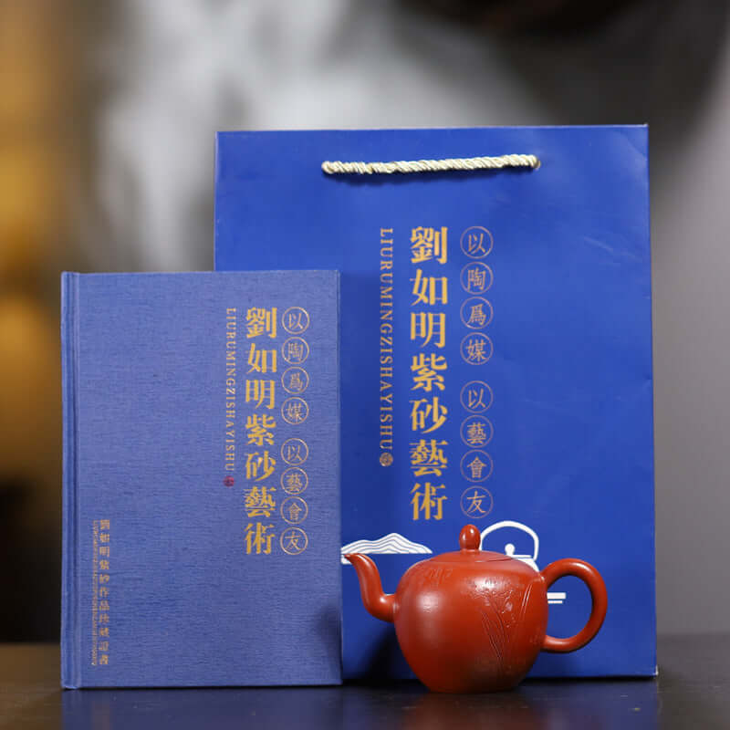 Handmade Yixing purple sand teapot with blue gift box and collection certificate by Liu Ruming.