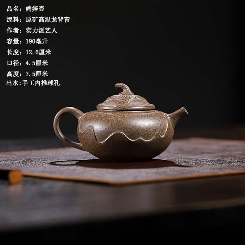 Handmade Yixing purple sand teapot with unique design, featuring fine craftsmanship and traditional style for tea brewing.