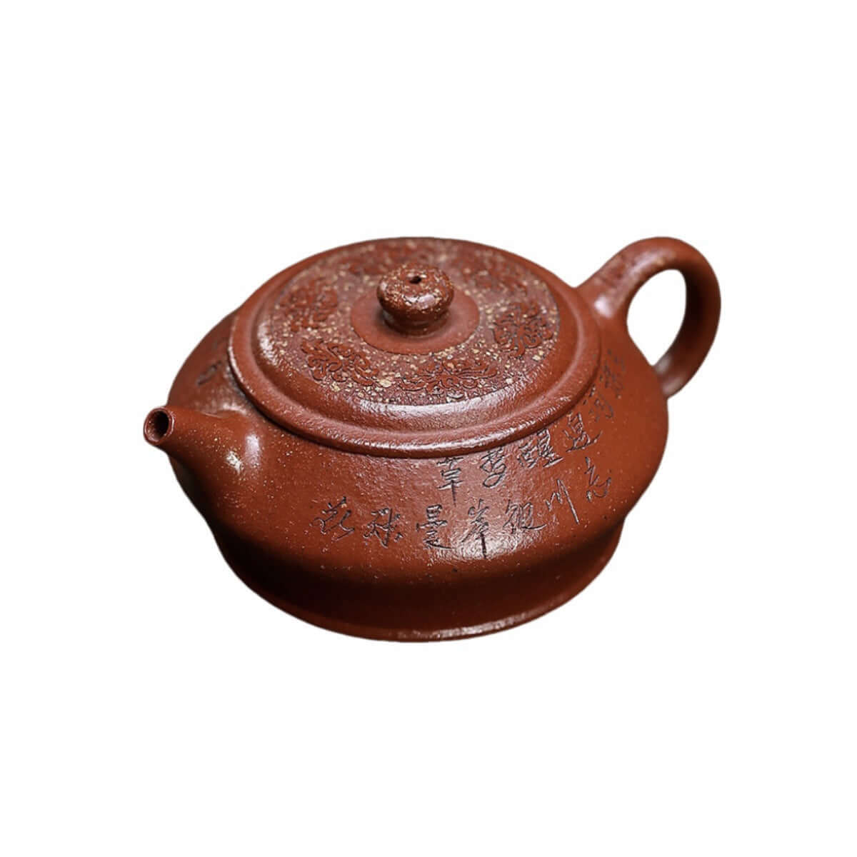 Handmade Yixing purple sand teapot with engraved designs, ideal for kung fu tea sets and tea lovers.