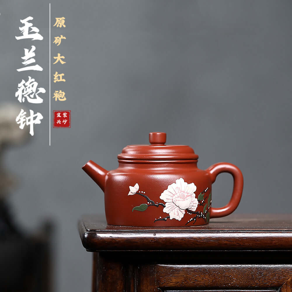 Handmade Yixing purple sand teapot featuring floral design, perfect for Kung Fu tea sets and home brewing.