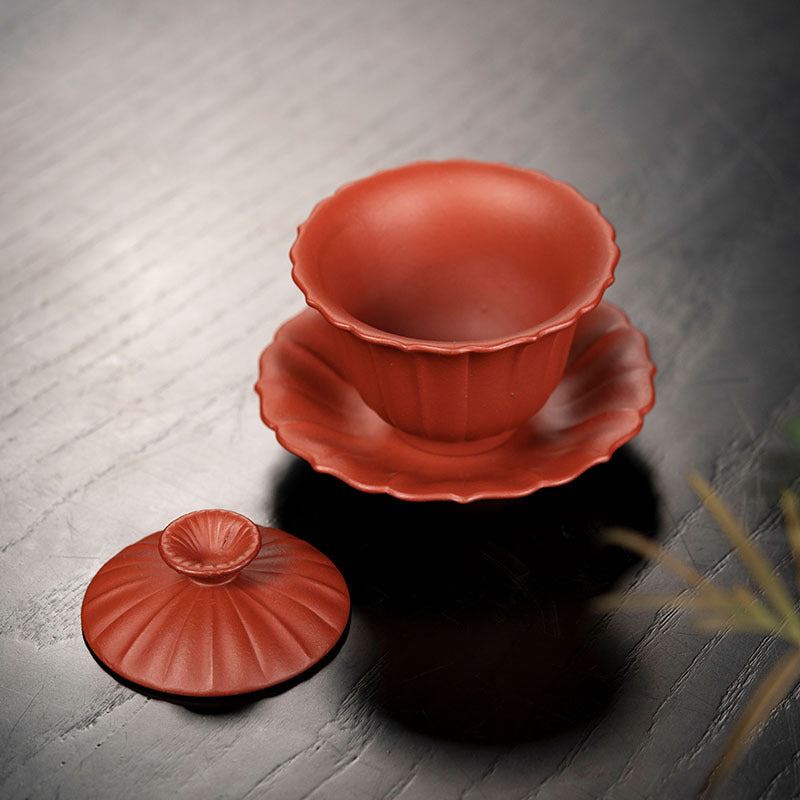 Handmade Yixing purple sand chrysanthemum tea cup with flap cover, showcasing original craftsmanship in raw ore material.