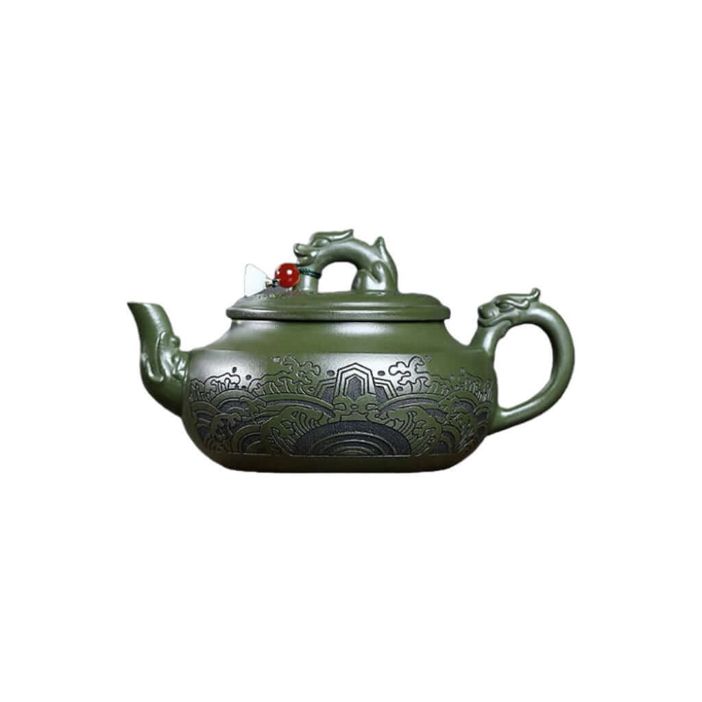 Handmade Yixing purple sand teapot in dark green with dragon design, ideal for Kung Fu tea ceremonies.