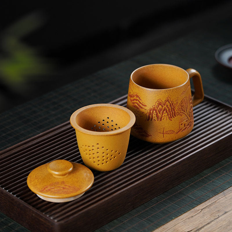 Handmade Yixing purple sand tea set with mountain view design, includes cup and lid, perfect for household use.