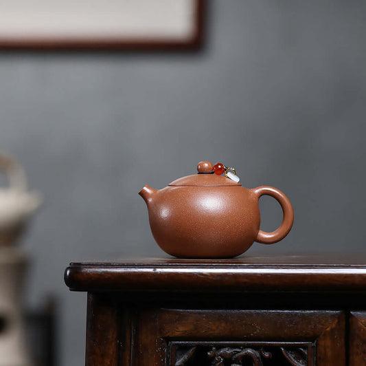 Handmade Yixing purple sand teapot featuring original mineral yellow slope mud design, perfect for Kung Fu tea ceremonies.