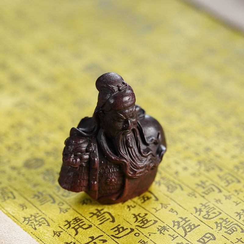 Handmade Yixing purple sand Guan Gong tea pet sculpture, creative tea ornament for tea lovers.
