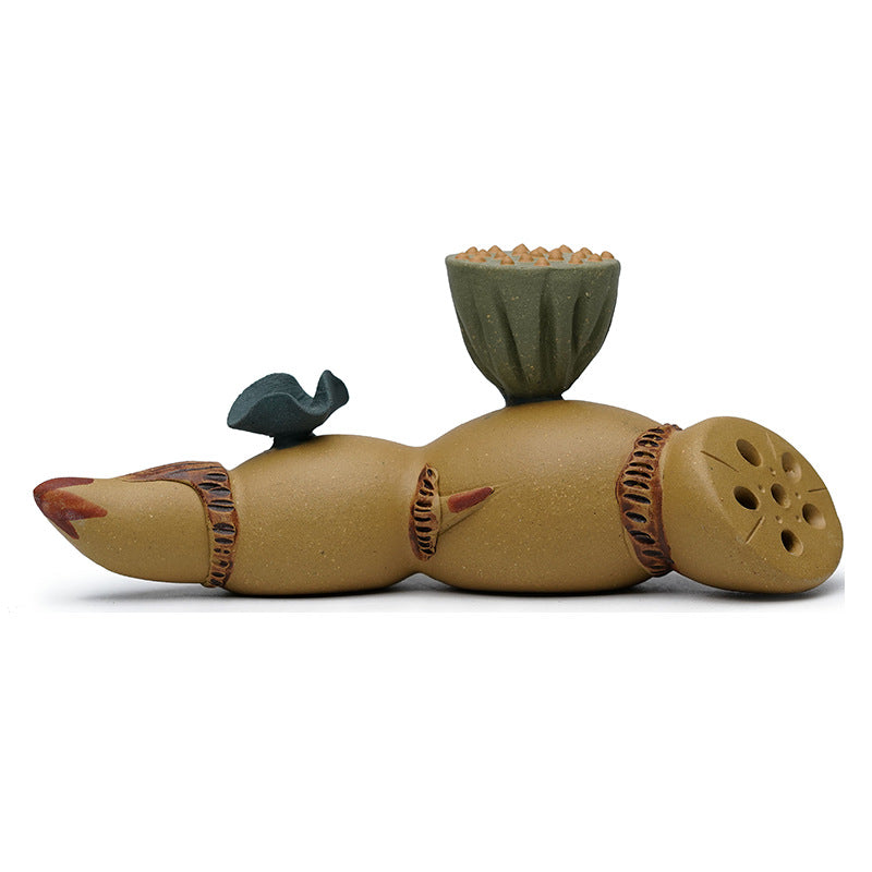 Handmade Yixing purple sand tea pet decoration resembling a lotus root, perfect for tea lovers and collectors.