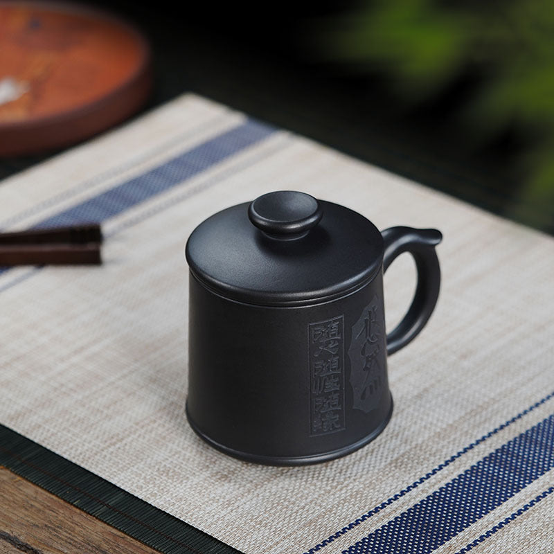 Handmade Yixing purple sand leisure cup, crafted by Yixing artisans for tea enthusiasts, perfect for gifts and ceremonies.