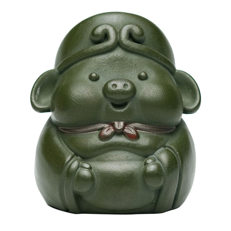 Handmade Yixing purple sand pig Bajie sculpture ornament for tea table, crafted from original green mud.