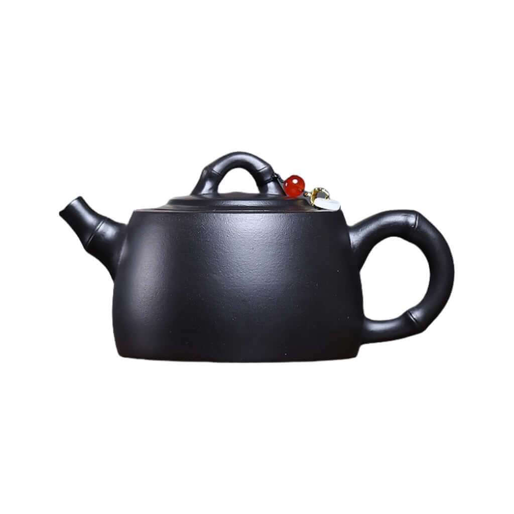 Handmade Yixing purple sand teapot in burnt gray, perfect for Kung Fu tea sets, showcasing traditional craftsmanship.