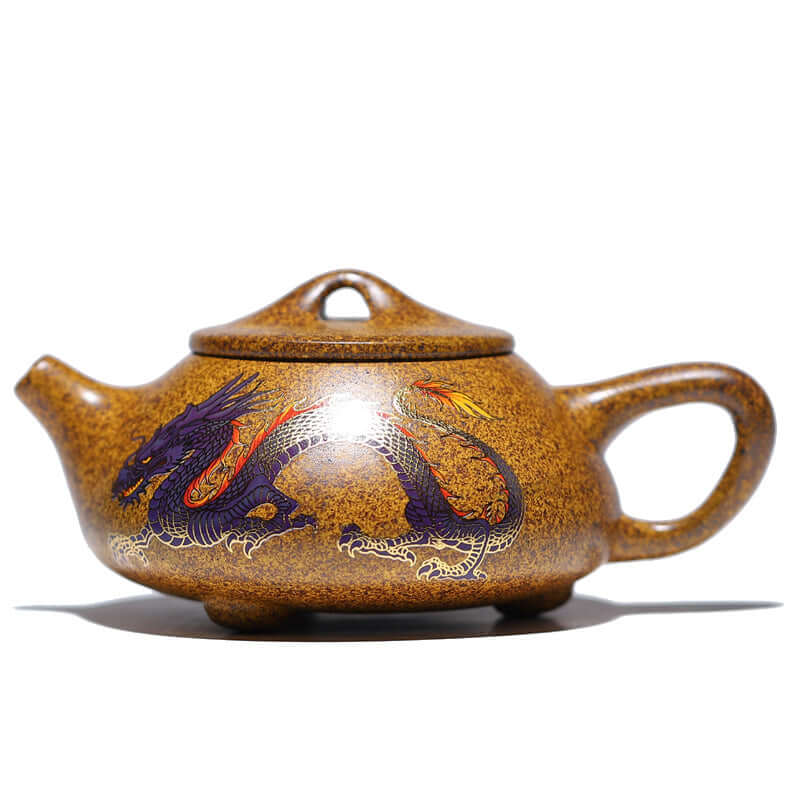 Handmade Yixing purple sand teapot with dragon design, color-changing features, and traditional craftsmanship.